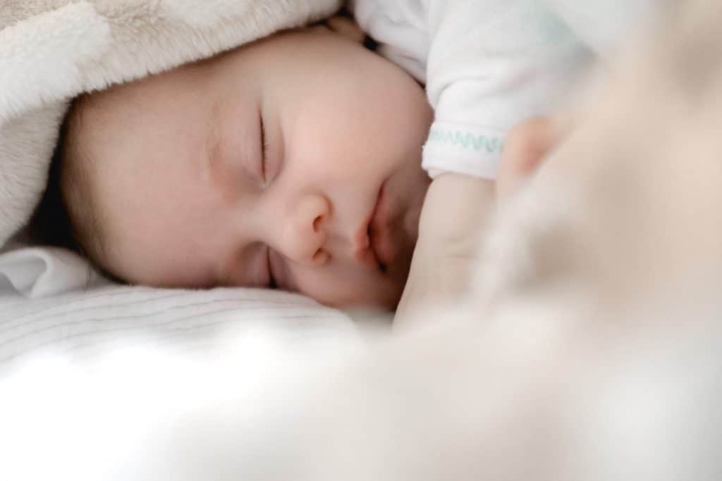 newborn won't sleep unless held
