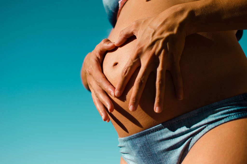 Early Pregnancy Symptoms - pregnant belly